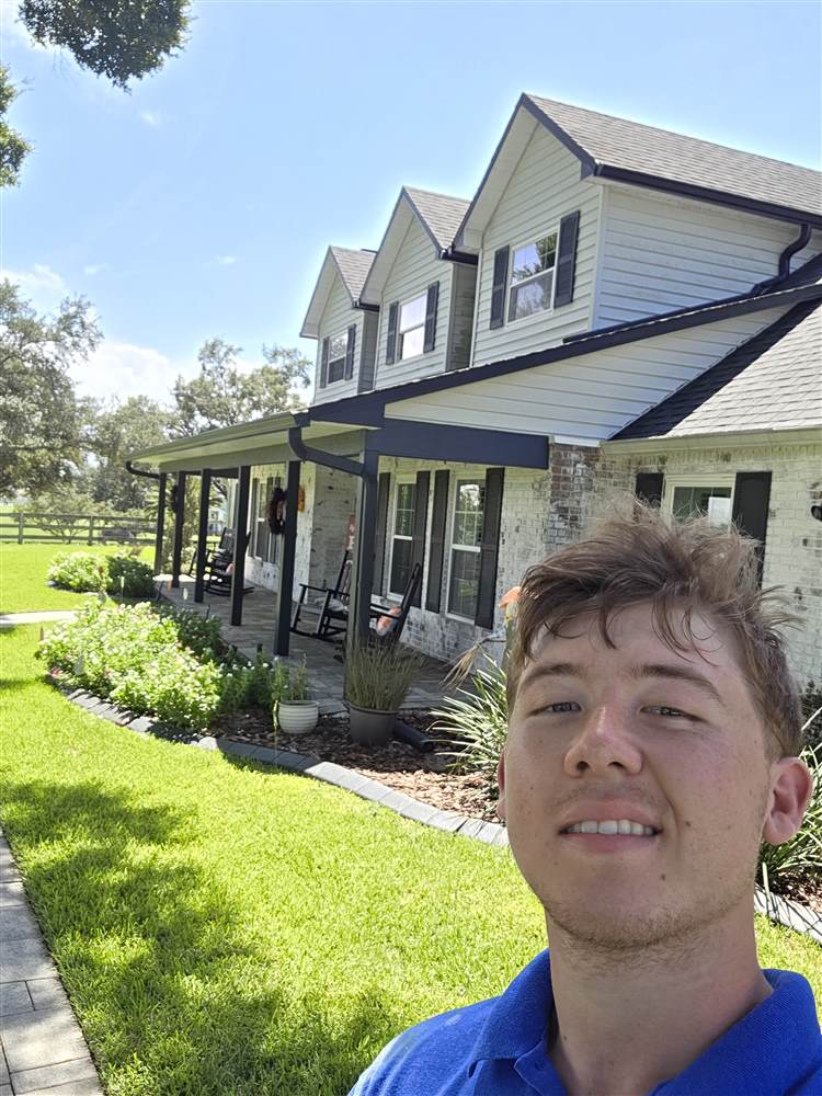 Micah, owner of Pressure Wash Boss LLC, on a job in Central Florida