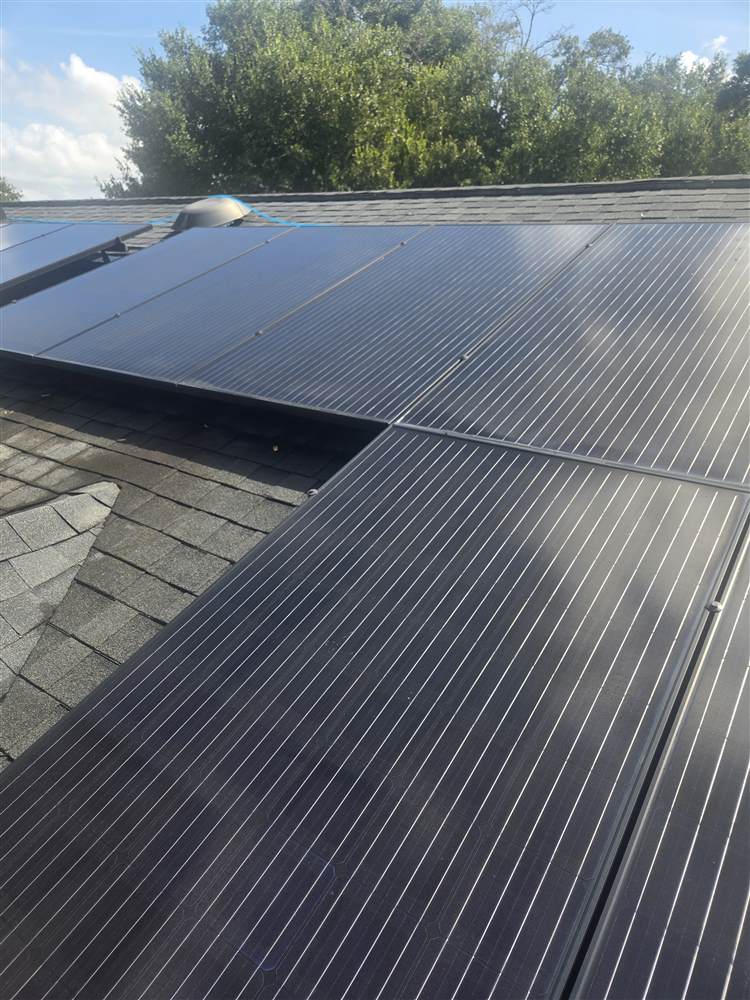 Rooftop solar panels after professional cleaning